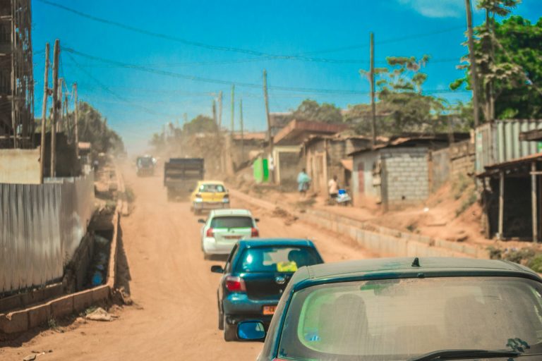 A dusty road in a neighbourhood of Yaounde, Cameroon. Photo by Ariel Nathan Ada @ Unsplash