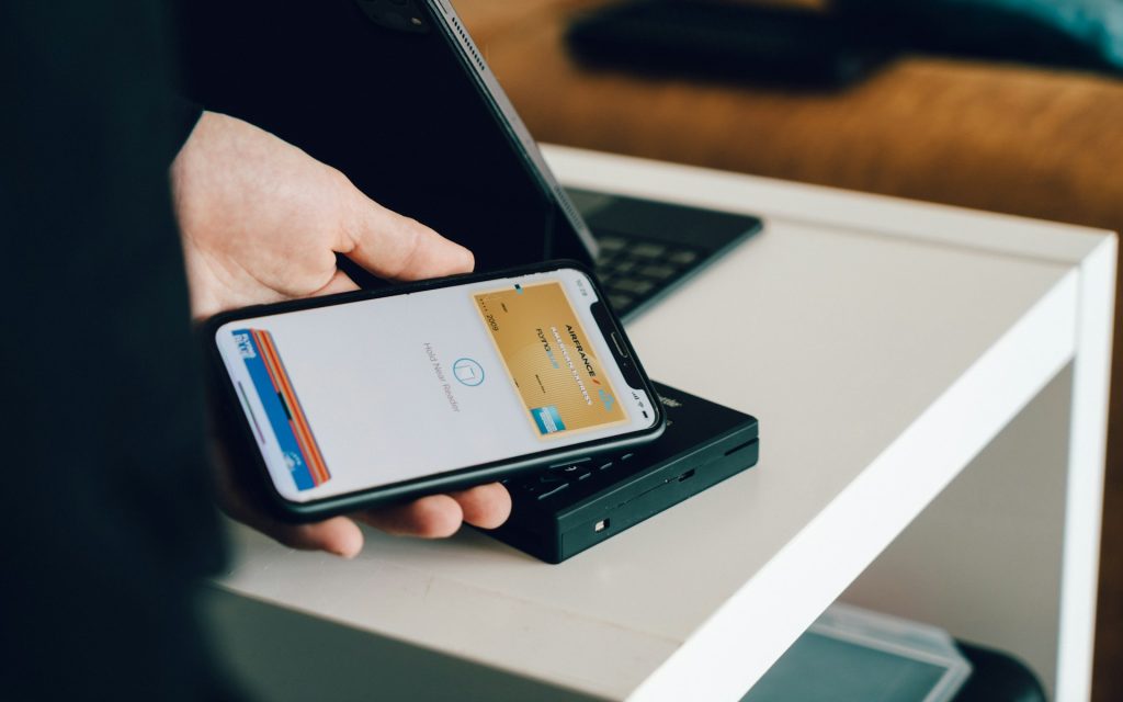 Mobile money transactions. Photo @ Unsplash