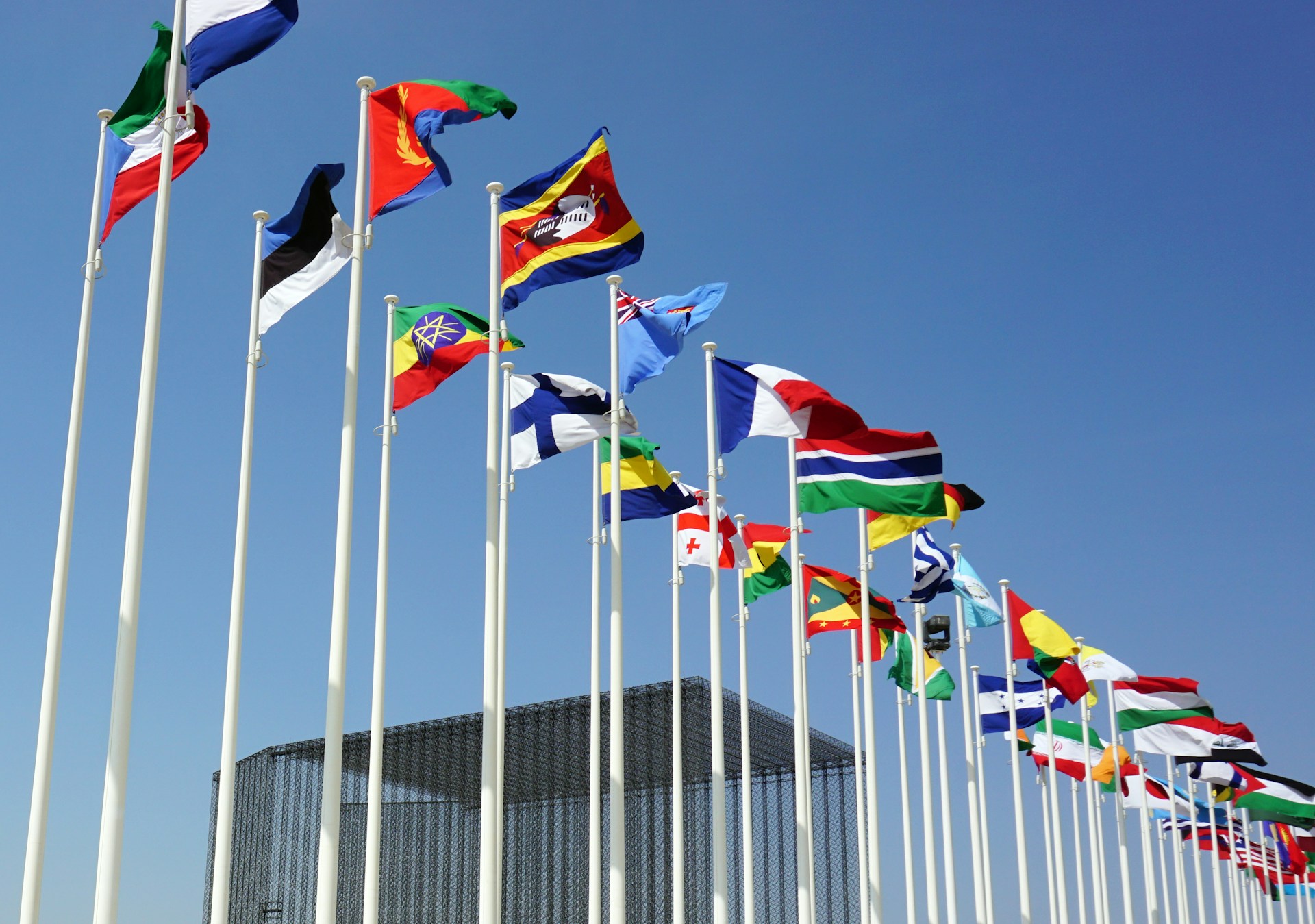 World flags. Photo by Saj Shafique @ Unsplash