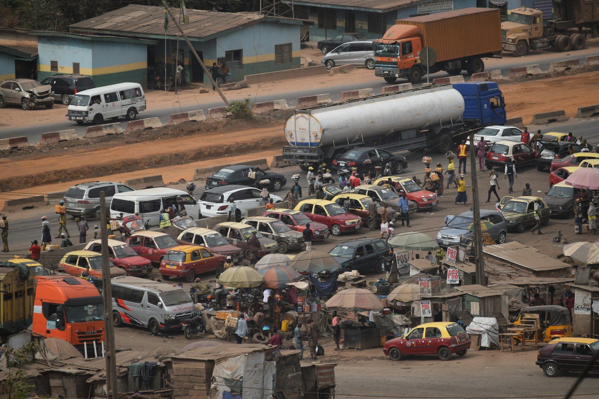 Parking lot in Ibadan, Nigeria. Photo by Fahd Aminu @ Unsplash