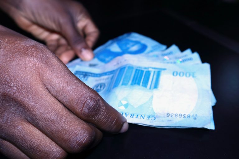Notes of money. Photo by Sunday Abegunde @ Unsplash