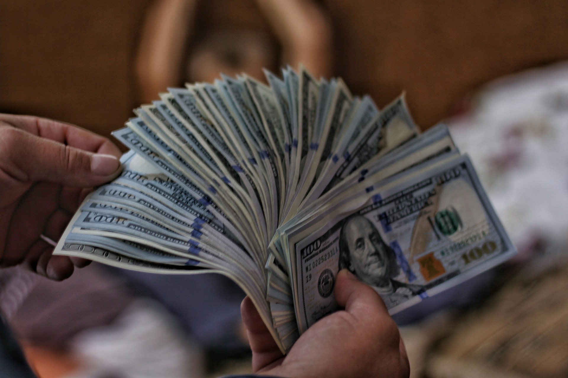 Notes of US dollars. Photo by Viacheslav Bublyk @ Unsplash