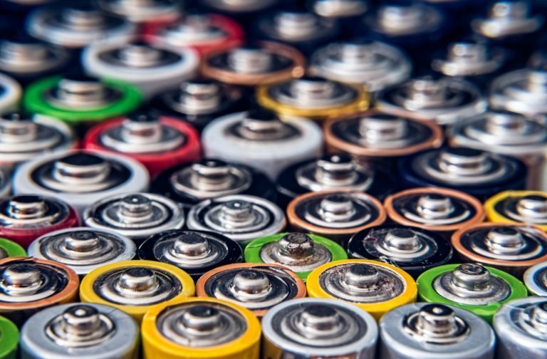 Used disposable drain batteries of various size. Photo by Roberto Sorin @ Unsplash