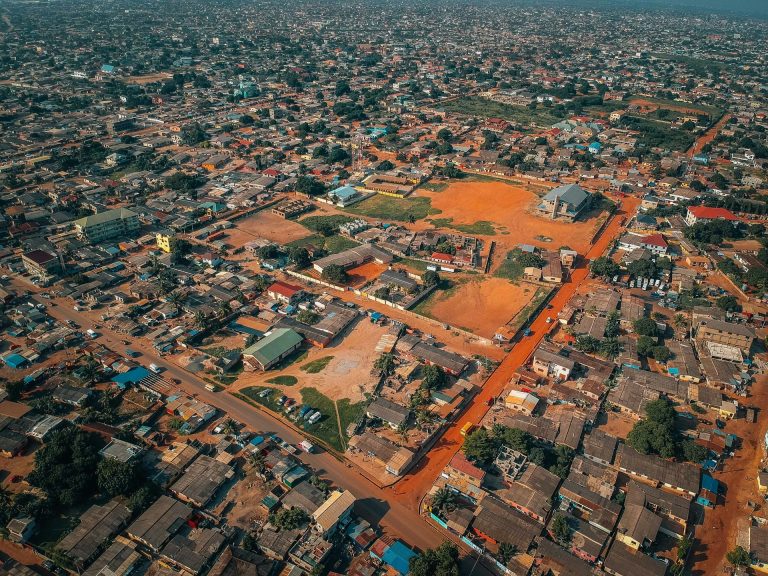 A drone shot of the vast landscape of Accra, Ghana. Photo by Virgyl Sowah @ Unsplash