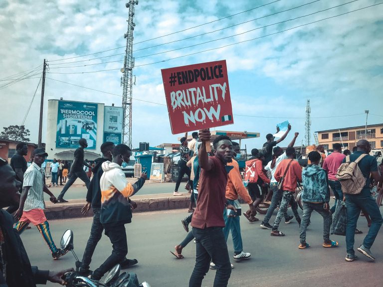 Young protestors. Photo by Oladipo Adejumo @ Unsplash