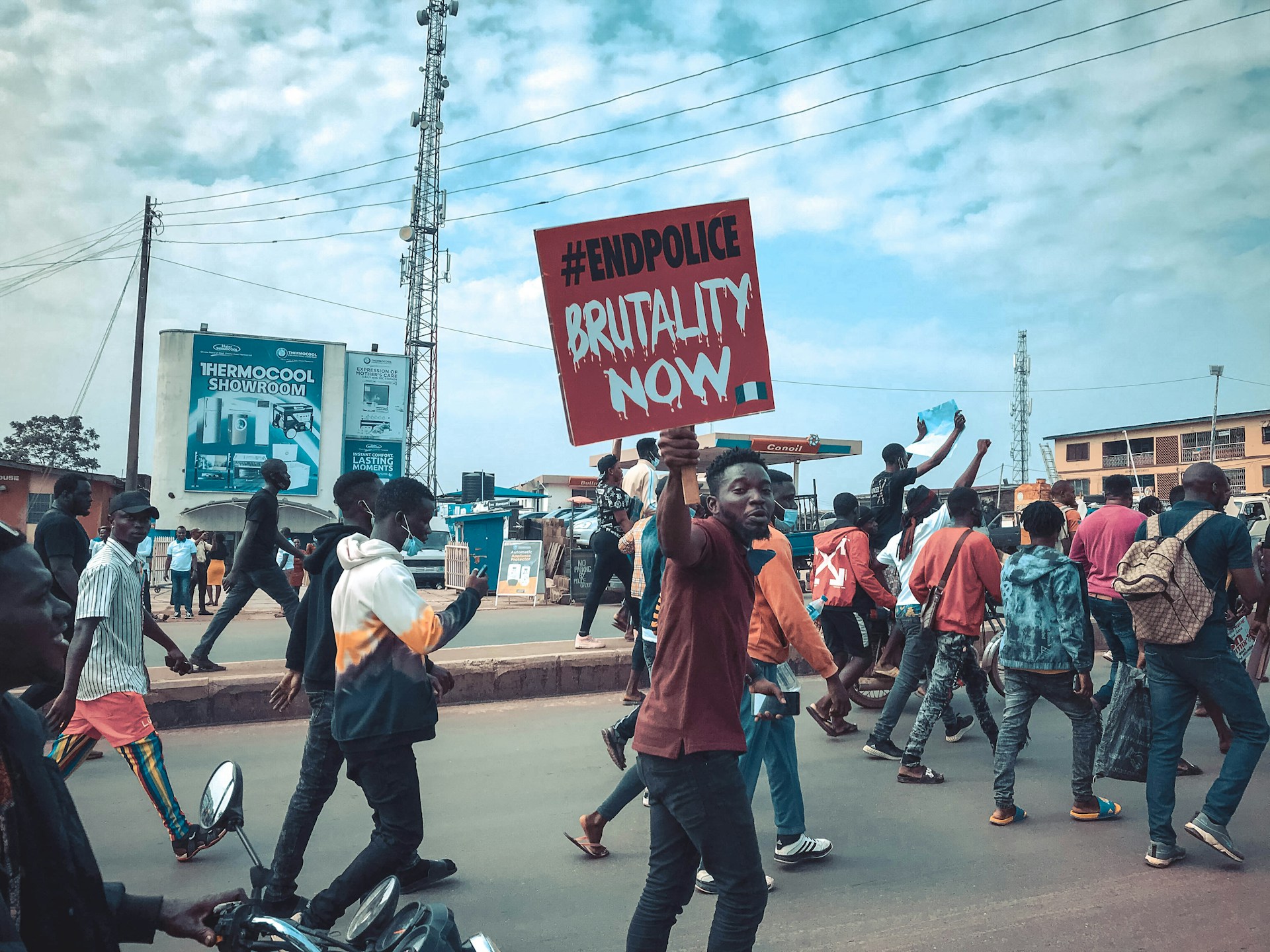 Young protestors. Photo by Oladipo Adejumo @ Unsplash
