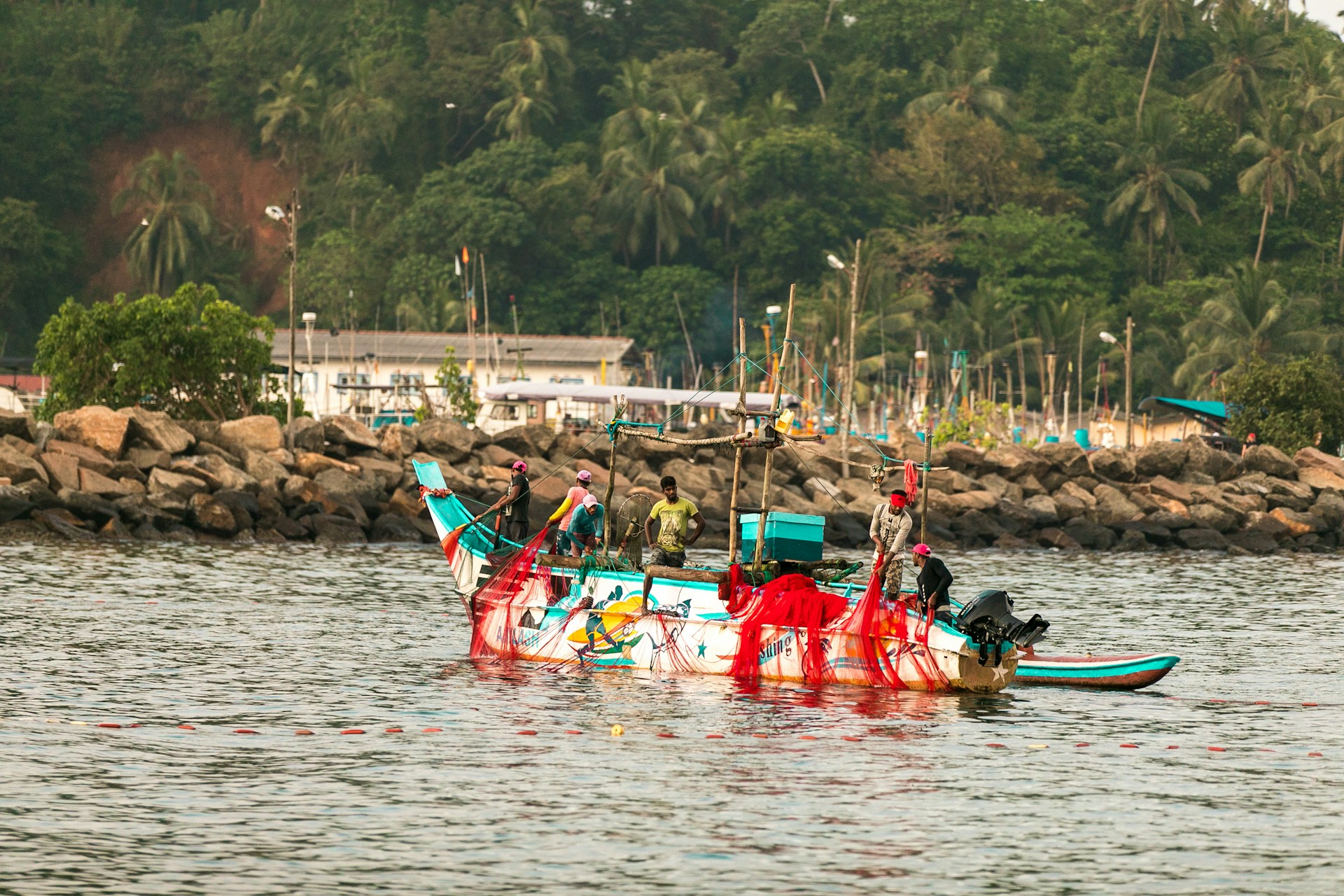 Fishing near the Indian Ocean. Photo by Egle Sidaraviciute @ Unsplash