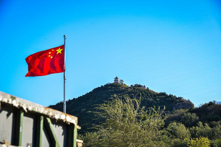 A flag of China. Photo by Bo Peng @ Unsplash