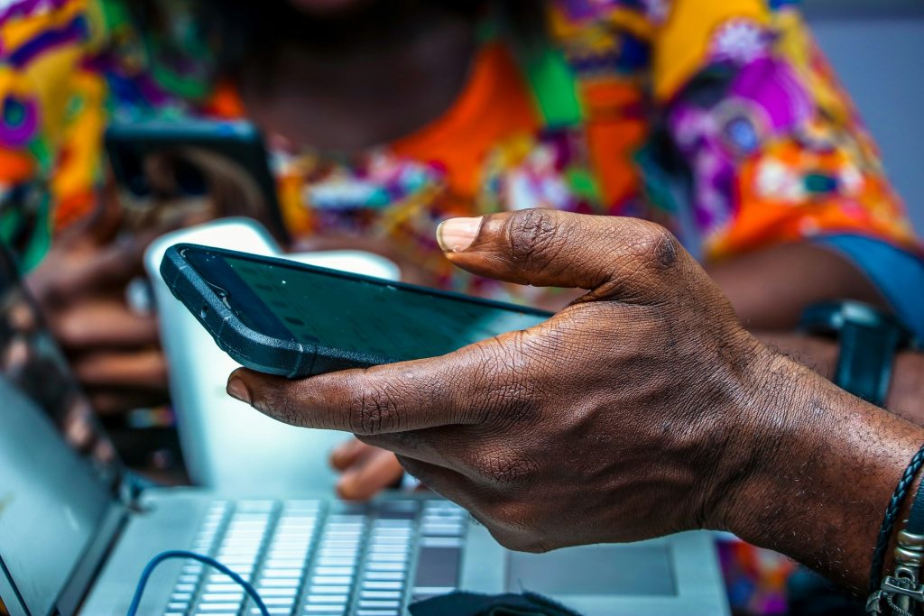 Mobile money instant payment in Africa. Photo by Olumide Bamgbelu @ Unsplash