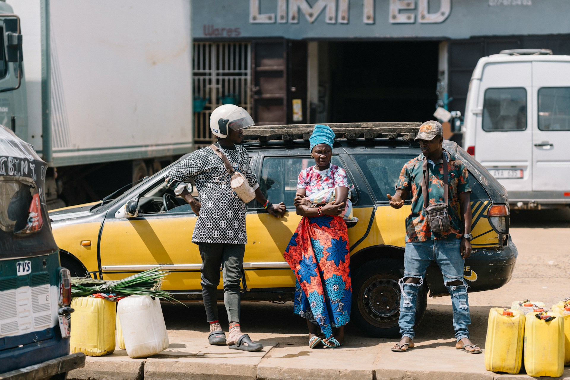 Commercial transport waiting spot in Sierra Leone. Photo by Random Institute @ Unsplash