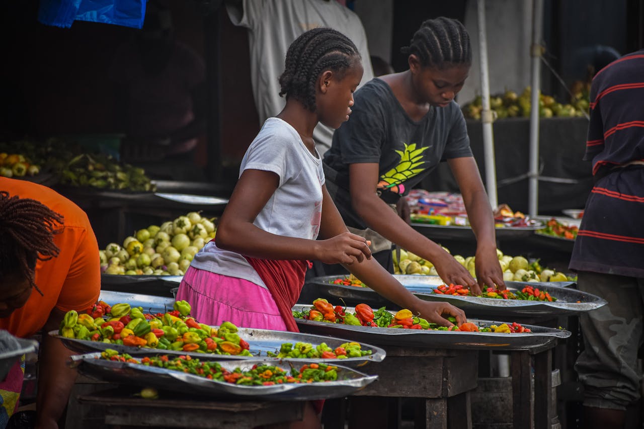 Local market scene in Monrovia, Liberia. Photo by B. Aristotlè Guweh Jr @ Pexels