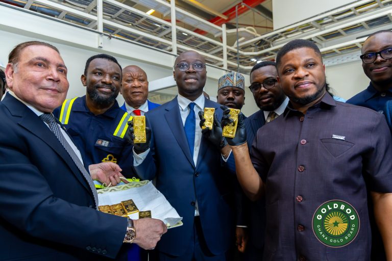 GoldBod CEO Sammy Gyamfi (far right) and others inspect the first batch of locally refined gold at the Gold Coast Refinery. Photo by GoldBod