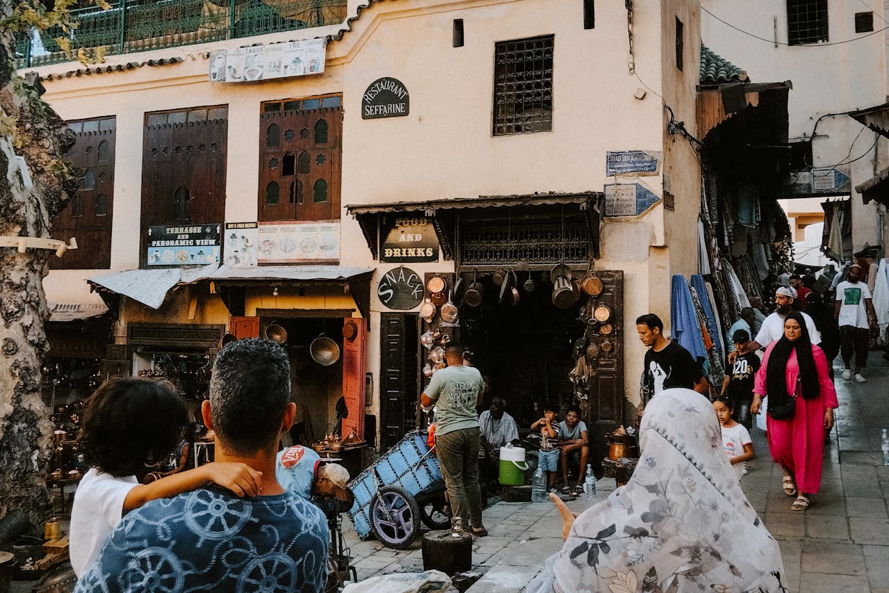 Bustling street scene in Fes Medina, Morocco. Photo by Abderrahmane Habibi @ Pexels