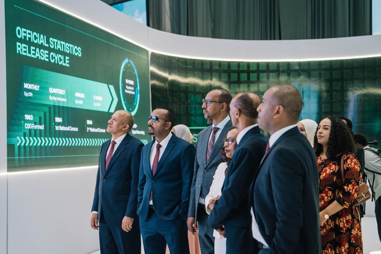 Deputy Ethiopian Prime Minister Temesgen Tiruneh (right), Prime Minister Abiy Ahmed (centre) and Deputy Prime Minister Adem Farah review a new data system alongside senior government officials. Photo: Abiy Ahmed/X