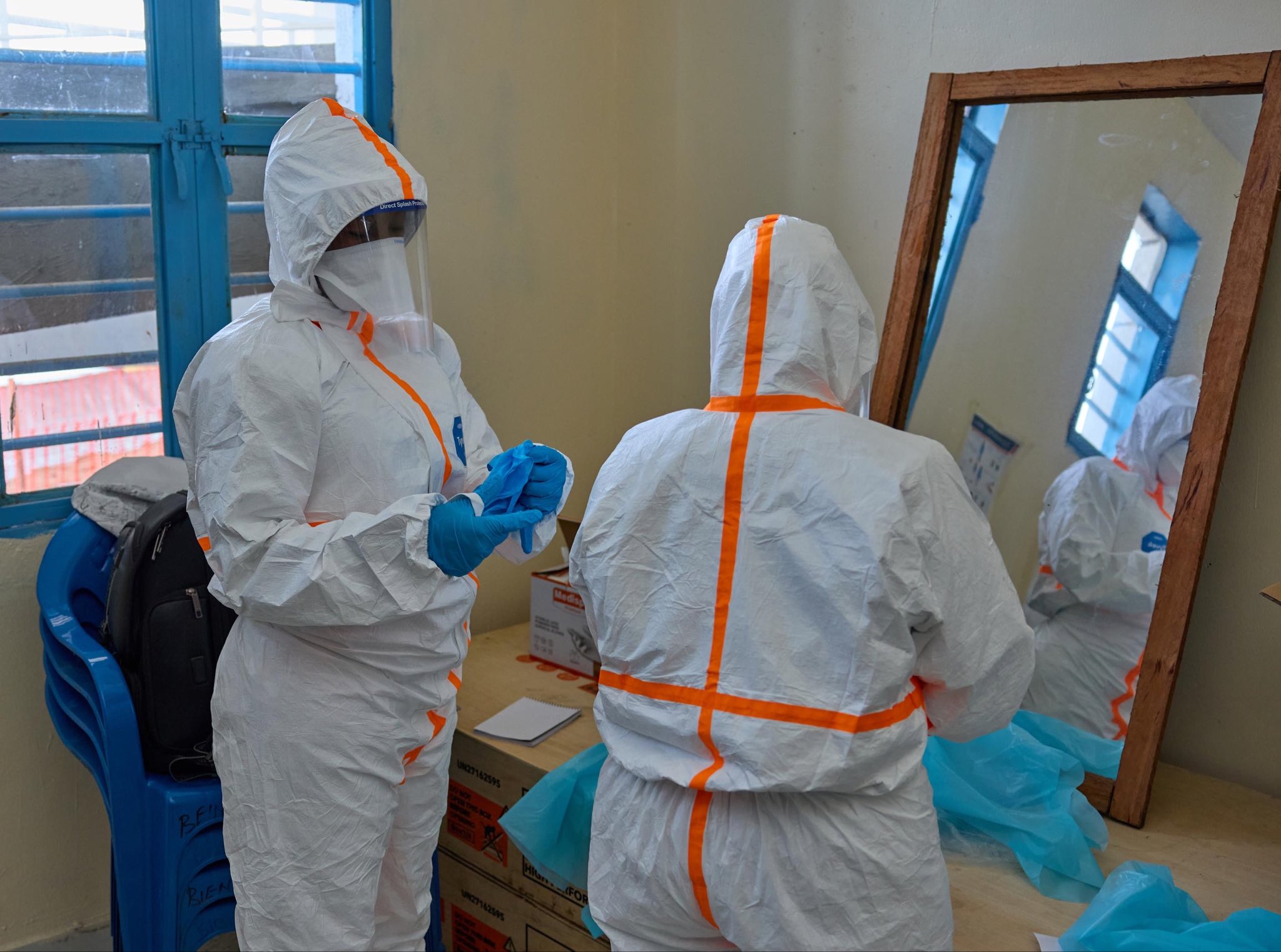 Health personnel at an Ebola quarantine centre. Photo by WHO