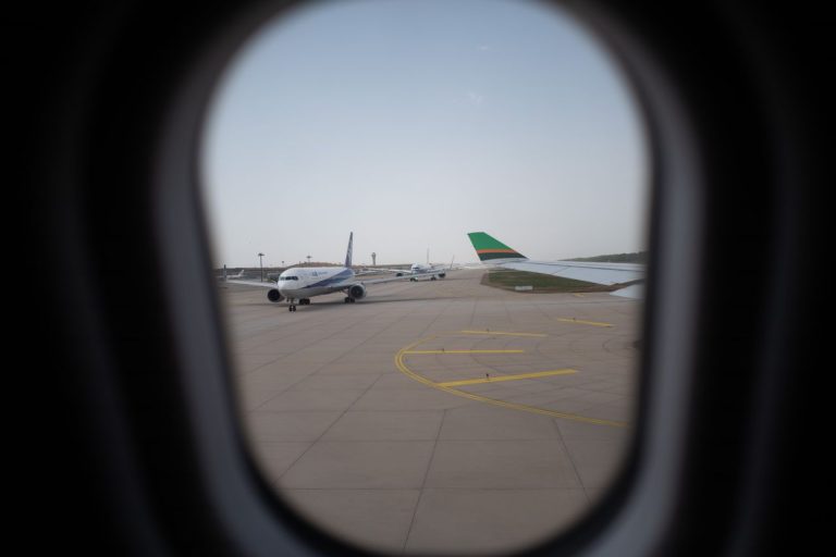Planes on the tarmac of an airport. Photo by Max Chen @ Pexels
