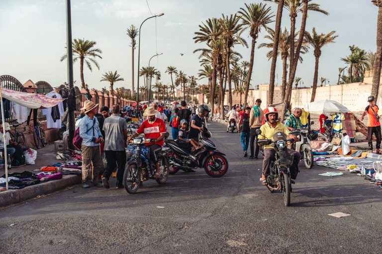 Football fans on the street of Marrakesh, Morocco. Photo by Graddes @ Unsplash