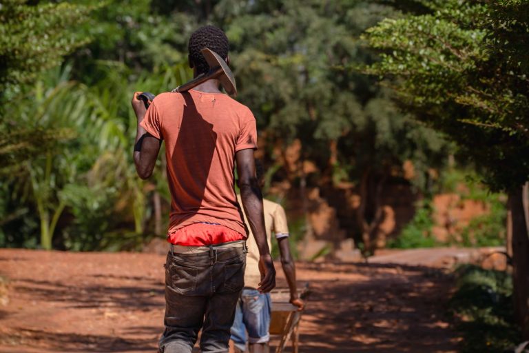 Miners on the field. Photo by Malama Mushitu @ Pexels