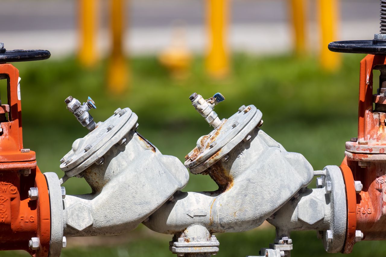 Industrial gas valves outdoors. Photo by David Brown @ Pexels